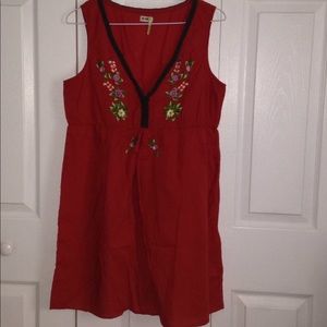 OLD NAVY: a red shirt with a flowered neck